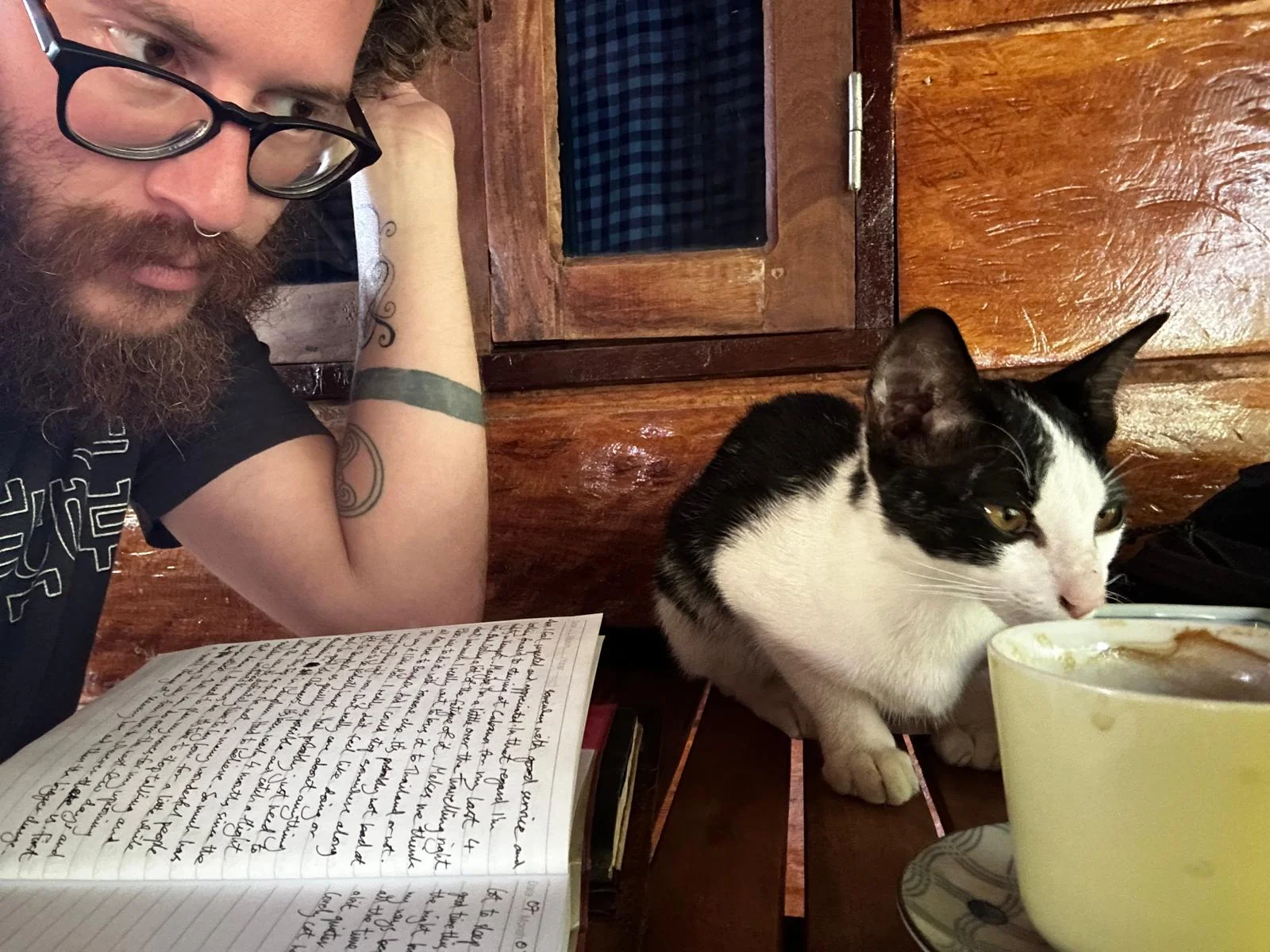 AJ journaling with a cat