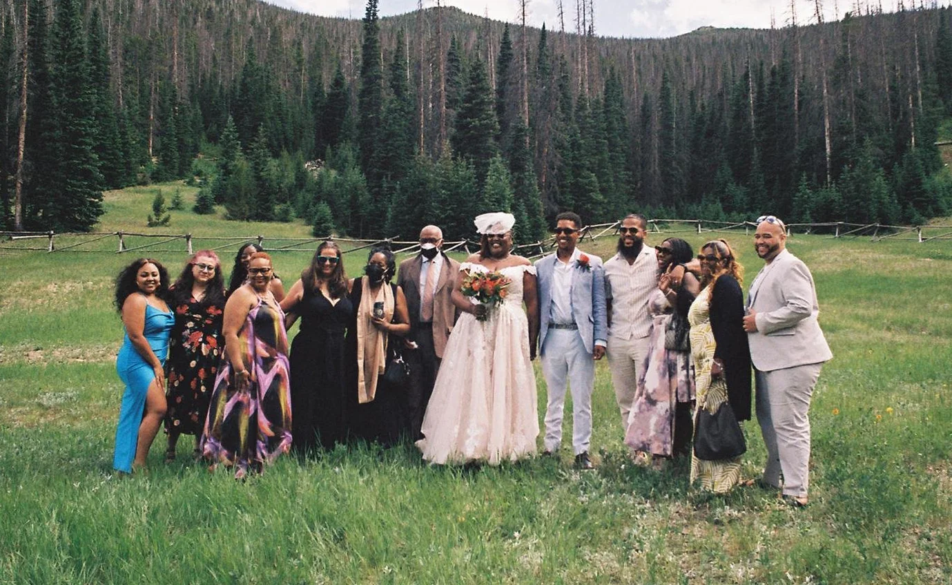 An adventurous couple hiking on a beautiful forest trail.