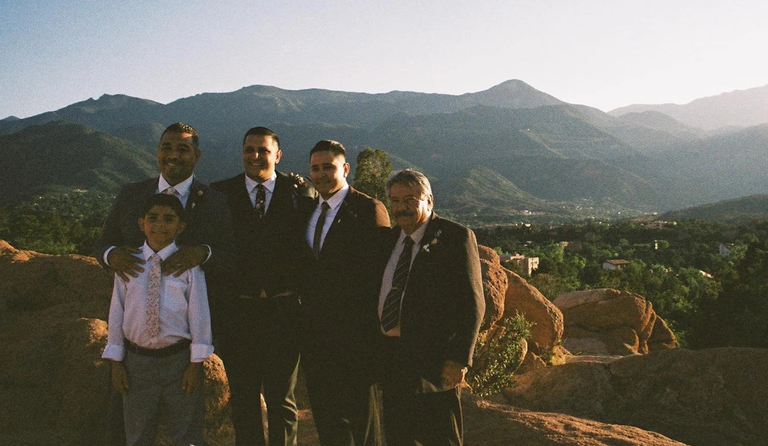 Couple wrapped in warm blankets during their mountain elopement.